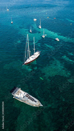 Aerial drone shot view of yachts in mediterranean sea in summer time near Nice, south France © Davidzfr