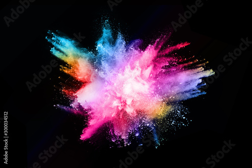 Fotobehang abstract colored dust explosion on a black background