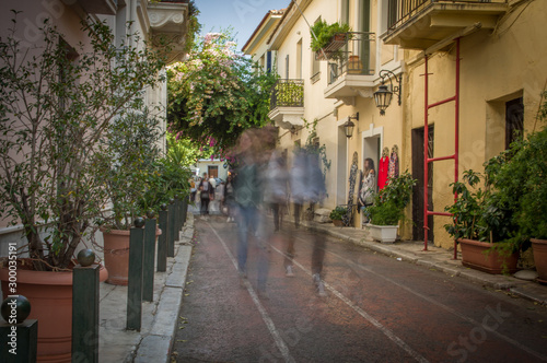 Walk in historic neighbourhood of Athens, Plaka, Greece on a beautiful autumn afternoon © Tadej