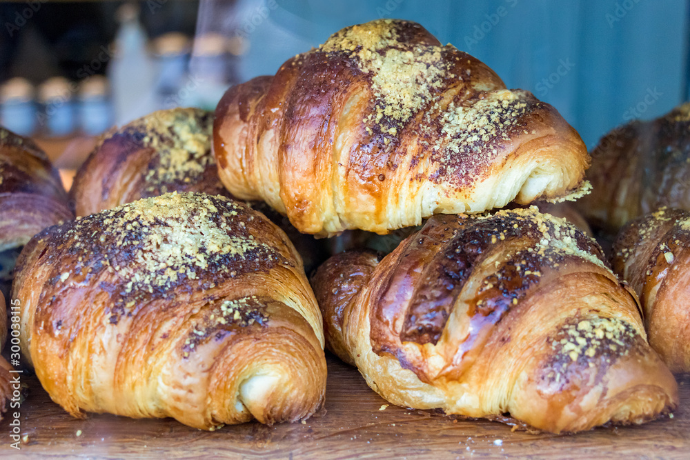 Close-up of french croissants just baked placed on the storefront of a bakery store in Iceland