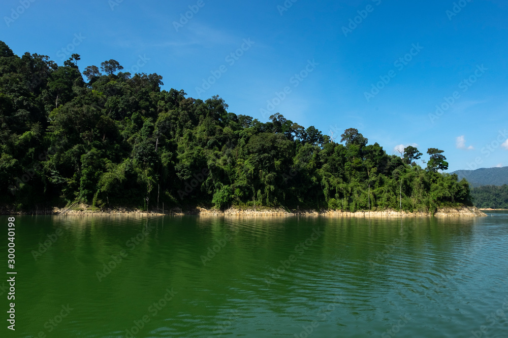 Beautiful image of rain-forest with reflection in water at Royal Belum State Park, Gerik Perak Malaysia. Beautiful image of rain-forest with reflection in water at Royal Belum State Park, Gerik Perak Malaysia.