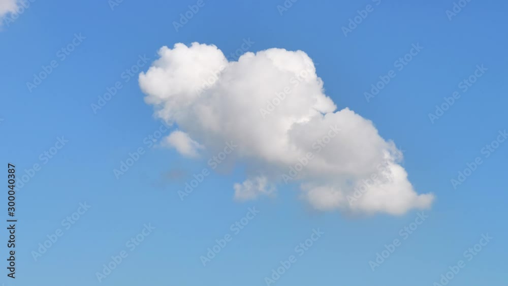 Time lapse clouds, rolling puffy clouds are moving, white clouds time lapse. Clouds running across the blue sky. 4k Timelapse of white clouds with blue sky in background.