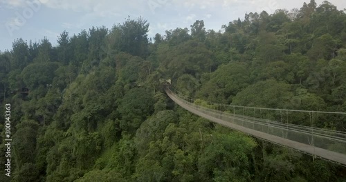 Aerial view of Indonesia's longest suspension bridge. Situ Gunung by Drone in 4K photo