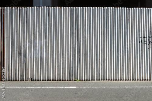 street wall background ,Industrial background, empty grunge urban street with warehouse brick wall