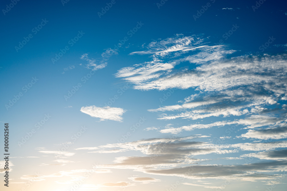 Evening sky with white clouds.