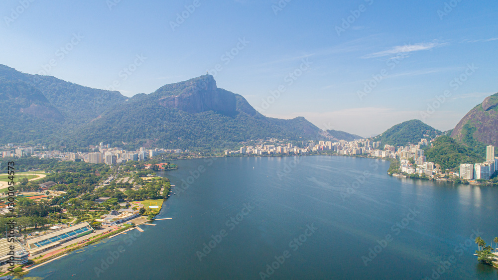 Aerial view of seawater lake Rodrigo de Freitas Lagoon (Lagoa) in city of Rio de Janeiro. You can see the statue of Christ the Redeemer in the background.