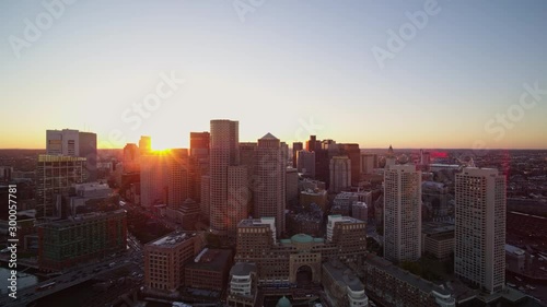 Boston Massachusetts Aerial v180 Flying through and out of downtown cityscape at sunset - October 2017