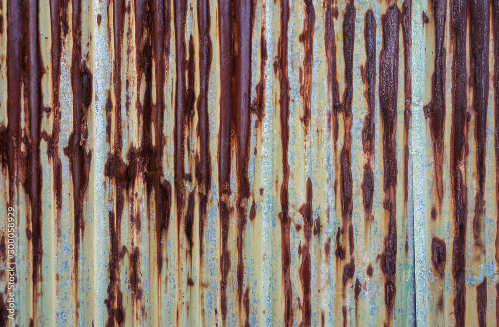 Rusty corrugated metal wall. Rusty corrugated metal wall.