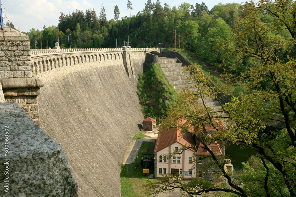 Fototapeta premium Hydroelectric power plant and dam on Bobr River in Pilchowice, Poland. Technical monument and tourist attraction.