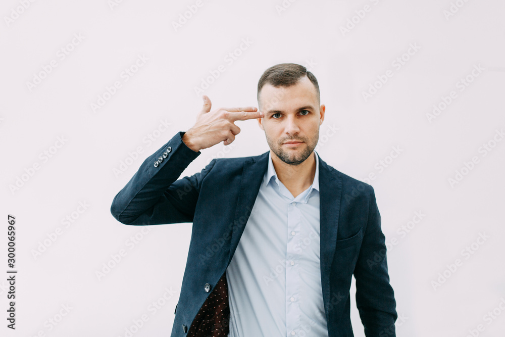 Failure and failure in the office, headache and anxiety. Portrait of a businessman with bad emotions. Failure and failure in the office, headache and anxiety. Portrait of a businessman with bad emotions.