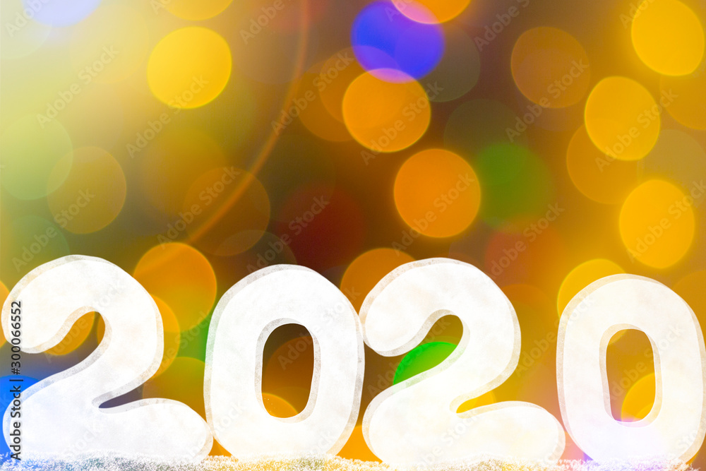 Happy new year 2020 isolated on black background with copy space for text, for holiday card. Blurred snowflakes, snow.