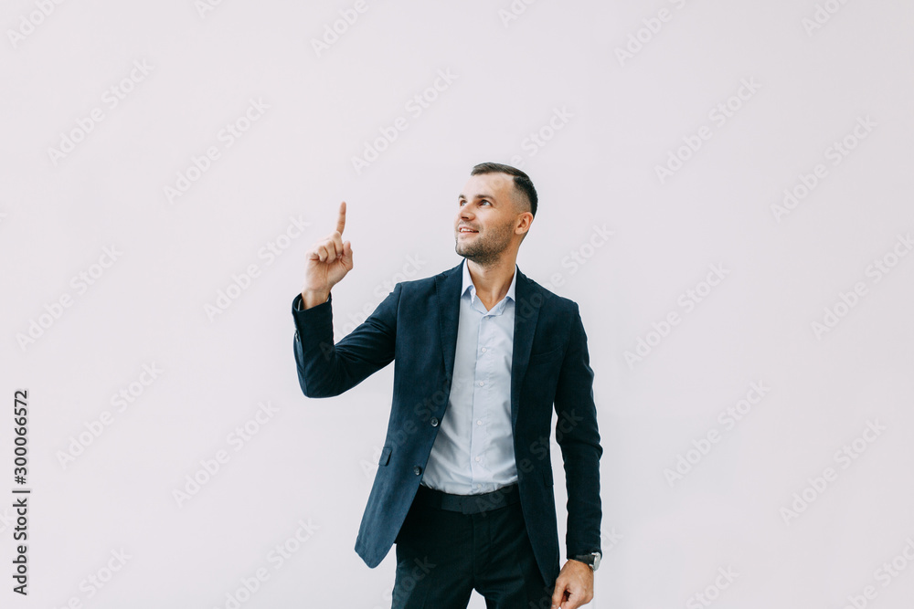 Success and luck in work, respect. Portrait of a young successful man with emotions. Success and luck in work, respect. Portrait of a young successful man with emotions.