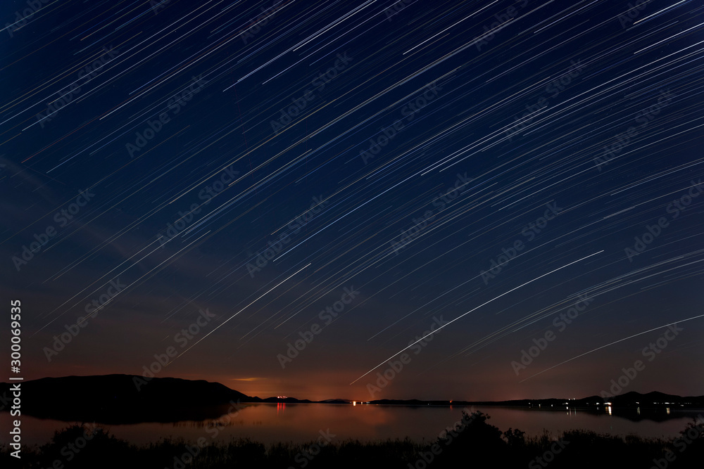 Starry night (startrails) in Vransko jezero Starry night (startrails) in Vransko jezero