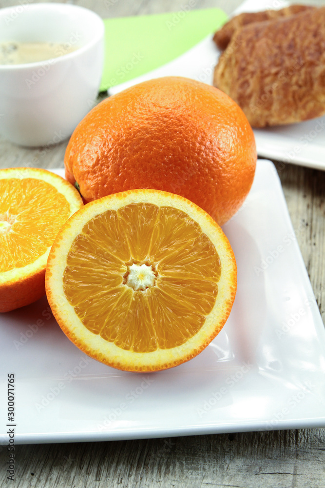 citrus fruits, oranges, grapefruit and lemon on a table citrus fruits, oranges, grapefruit and lemon on a table