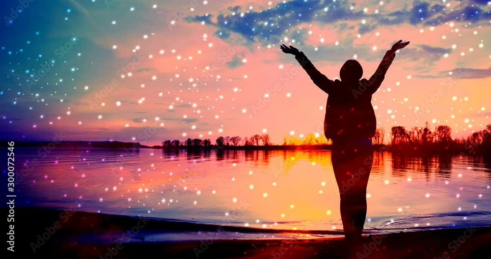 Young woman silhouette against starry sky background Young woman silhouette against starry sky background