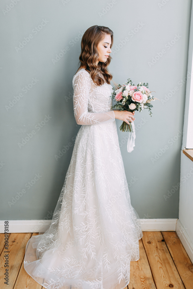 Stylish wedding in European style. Portrait of the bride in the style of fine art, white dress. Stylish wedding in European style. Portrait of the bride in the style of fine art, white dress.