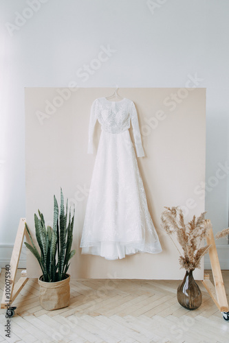 Stylish dress in European style. Details of the wedding dress, the morning and the bride's fees.
