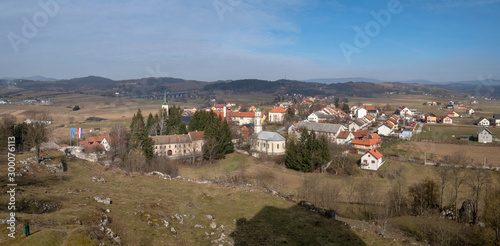 Ruins of the castle Sokolac and village Brinje in background, Lika, Croatia