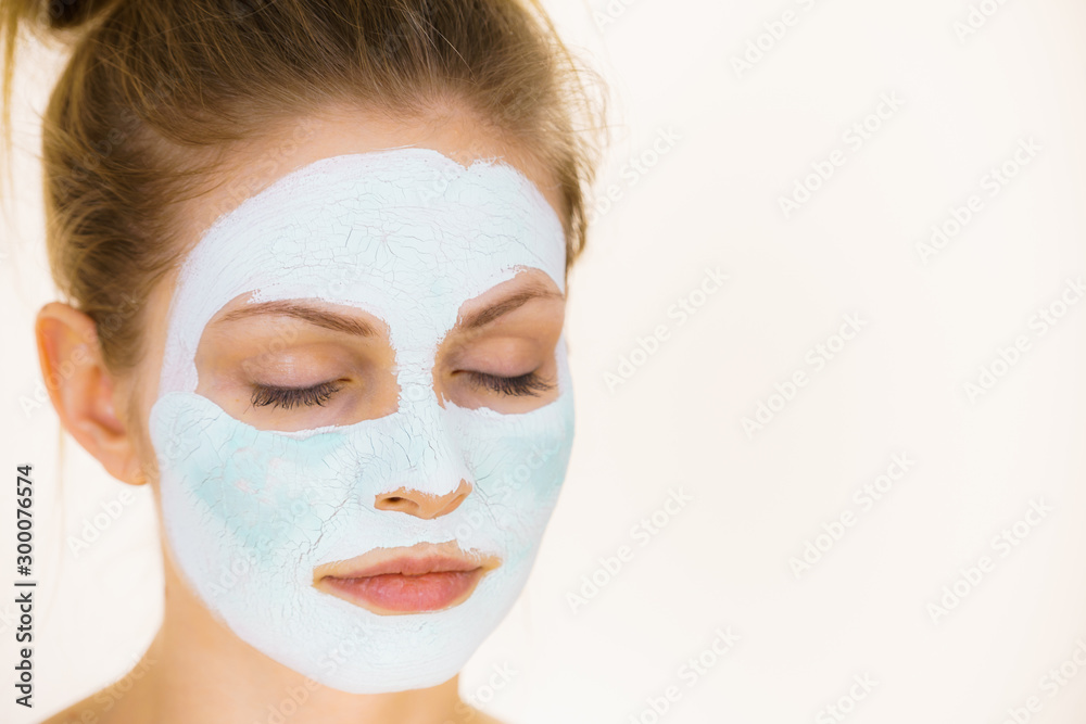 Girl with green mud mask on face Girl with green mud mask on face