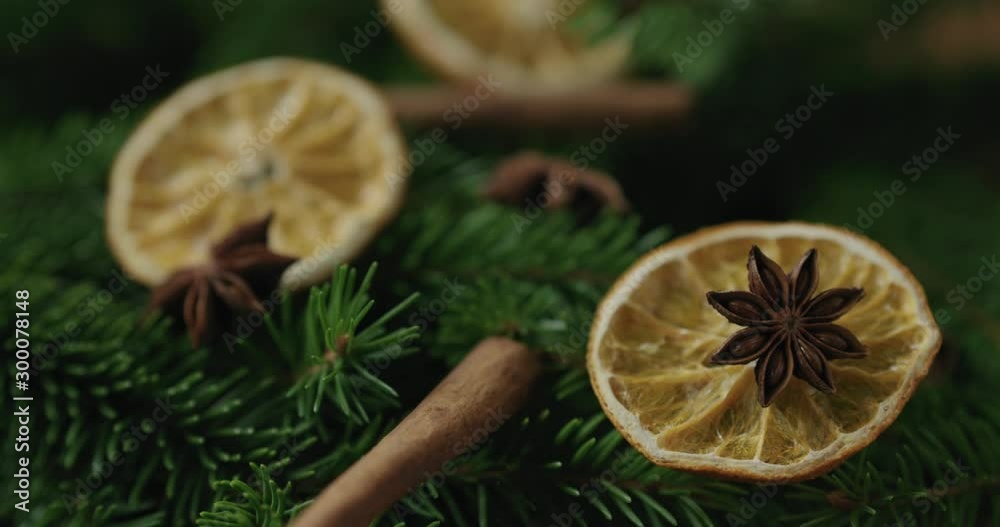 Closeup forward slide shot of spruce twigs with decorations Closeup forward slide shot of spruce twigs with decorations