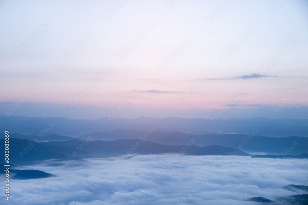 Mountain fog sky clouds landscape in the morning.
