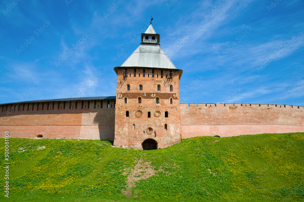Spasskaya tower of the Novgorod Kremlin on a sunny May day. Veliky Novgorod, Russia Spasskaya tower of the Novgorod Kremlin on a sunny May day. Veliky Novgorod, Russia