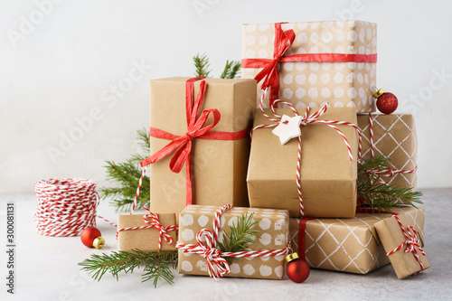 Christmas background with big heap of gift boxes and decoration.