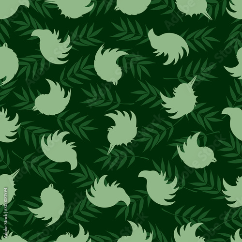 Seamless pattern of silhouettes of birds and rowan leaves. Mood Color - Green