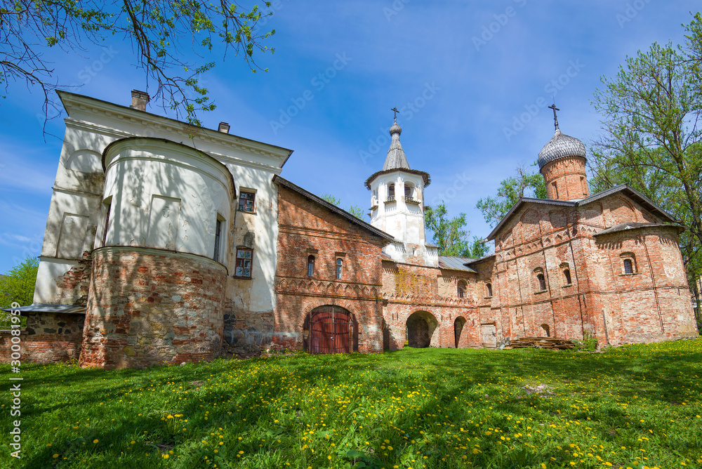 Ancient double church (Blagoveshchenskaya and Mikhail Archangel) close-up on a sunny May day. Veliky Novgorod, Russia