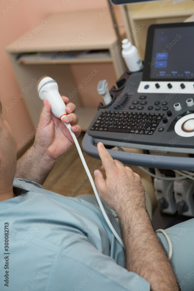 ultrasound examination at the doctor of a young girl ultrasound examination at the doctor of a young girl