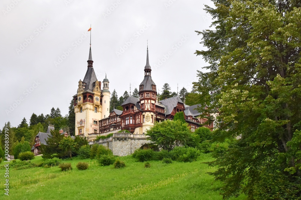 Sinaia, Romania - August 2019. Great Pelesh castle and park in Sinaia, Romania. Romania King Carol Palace and park with medieval beautiful buildings Sinaia, Romania - August 2019. Great Pelesh castle and park in Sinaia, Romania. Romania King Carol Palace and park with medieval beautiful buildings
