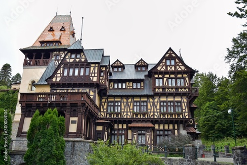 Sinaia, Romania - August 2019. Great Pelesh castle and park in Sinaia, Romania. Romania King Carol Palace and park with medieval beautiful buildings 