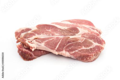 resh raw pork neck meat garlic pepper and rosemary isolated on white