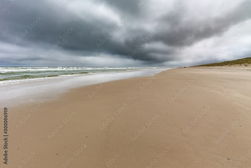 Clouds over the beach on Juist, East Frisian Islands, Germany.