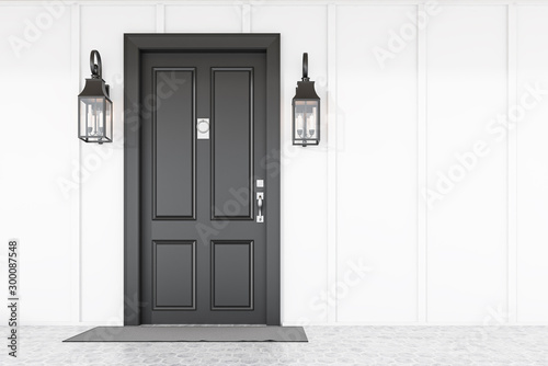 Photo Black front door of white house with mat