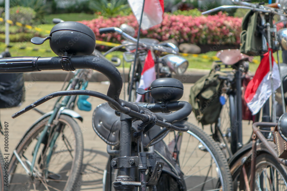 Selective Focus handlebar Retro styled of a nineteenth century bicycle on indonesian city Selective Focus handlebar Retro styled of a nineteenth century bicycle on indonesian city