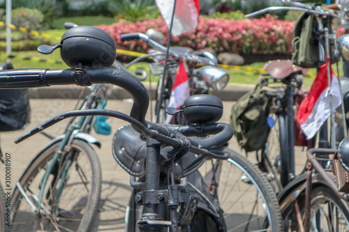 Selective Focus handlebar Retro styled of a nineteenth century bicycle on indonesian city