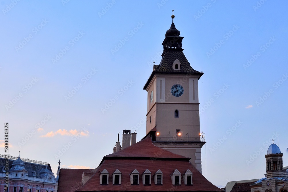 Brasov, Romania - August 2019. Historical building in the Brasov old town. View on famous tourist attraction in Brasov. Beautiful cityscape with Brasov landmarks in the evening 