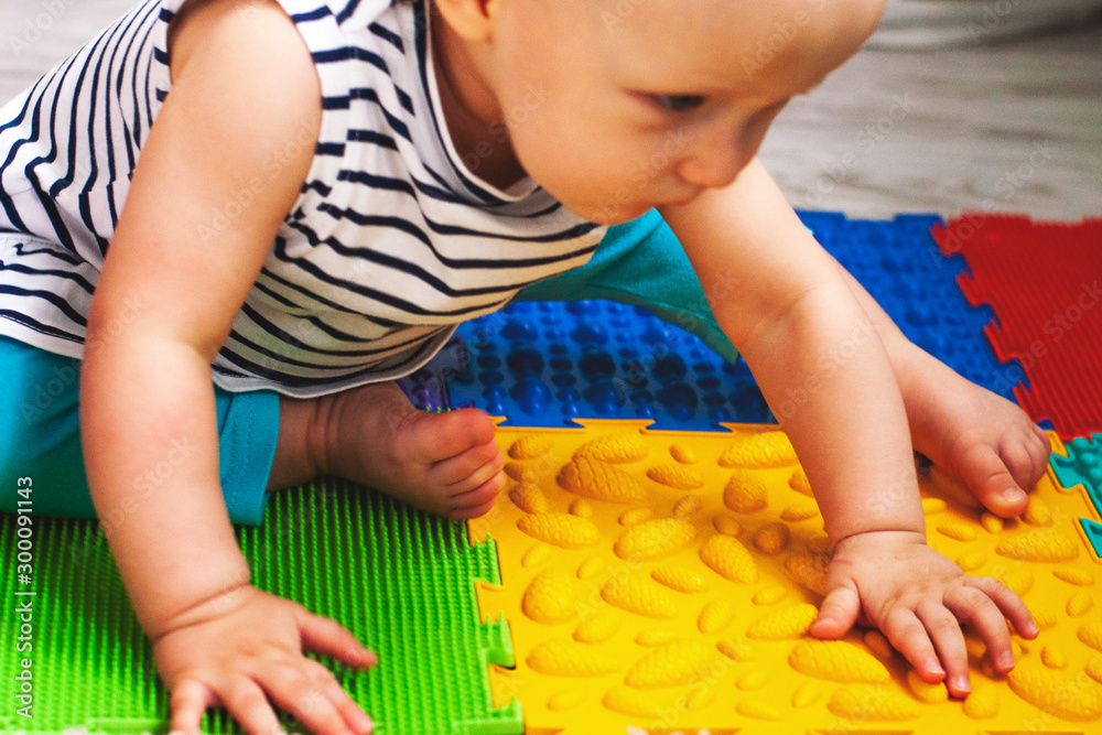 Education and development of the child.Massage and orthopedic mat, carpet for children. Early development, orthopedics Education and development of the child.Massage and orthopedic mat, carpet for children. Early development, orthopedics