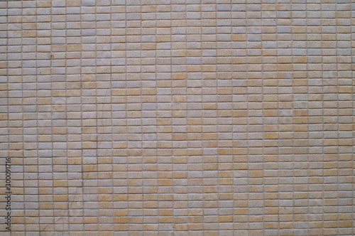 Wall decorated with small tiles