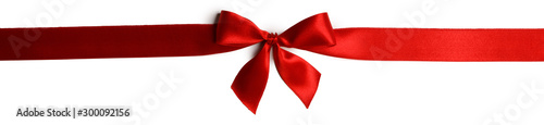 Red gift bow on white photo