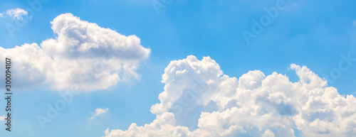 Photography The white fluffy clouds and light blue sky in the sunny day.