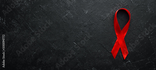 Картината върху платно red ribbon symbol of World AIDS Day. Top view. Free copy space.
