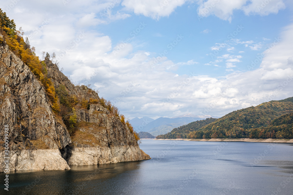 Dam and reservoir on Lake Vidraru. Hydropower construction, waterworks Dam Vidrau on Transfagarash highway in Romania