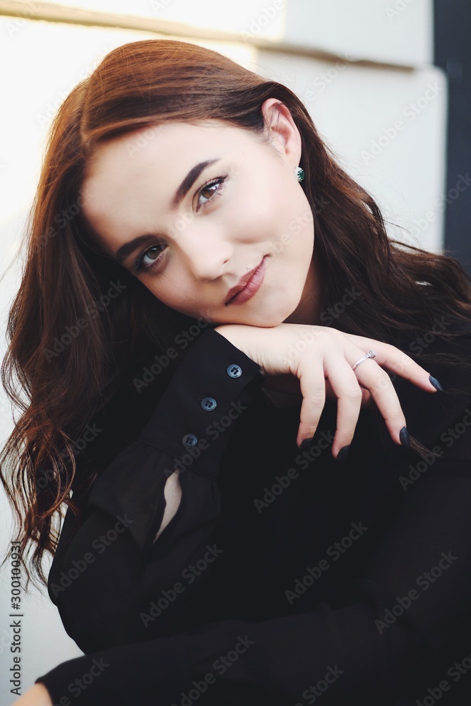 Young pretty girl walking down the street, retro portrait