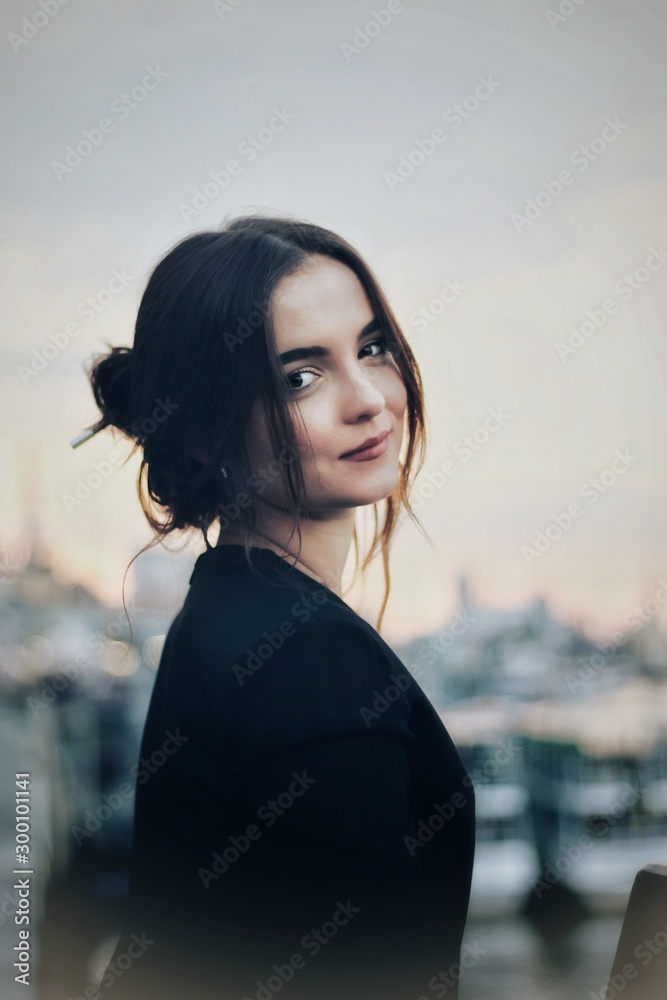 Young pretty girl walking down the street, retro portrait
