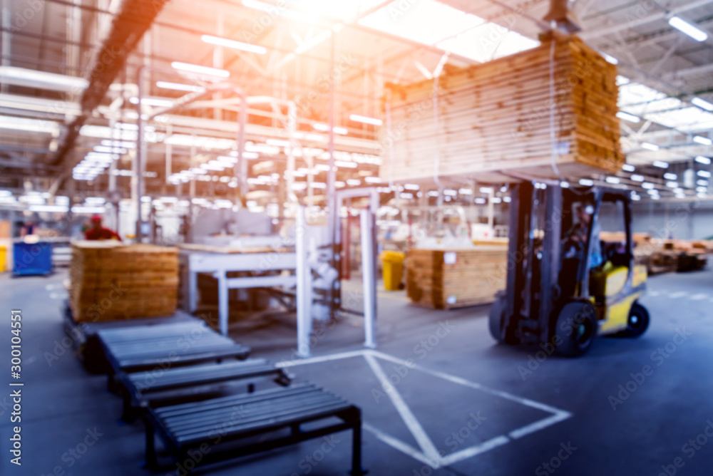 Bloored background of forklift loader in storage warehouse ship yard. Distribution products. Delivery. Logistics. Transportation. Bloored background of forklift loader in storage warehouse ship yard. Distribution products. Delivery. Logistics. Transportation.