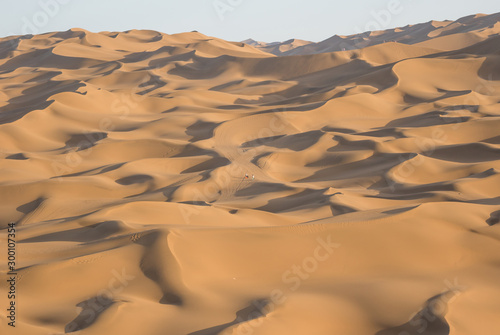 Kumtag Desert, China - a section of the wider Taklamakan Desert, and part of the Tarim Basin, the Kumtag Desert is famous for it's sandy dunes and the beauty of its landscape photo