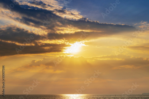 landscape of sunset on the coast sea  waves  horizon. top view.