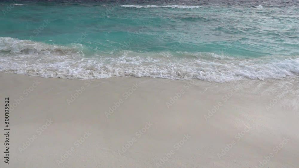 Waves crashing on sandy beach at windy day. Slow motion 240 fps. HD 1080p stock video footage Waves crashing on sandy beach at windy day. Slow motion 240 fps. HD 1080p stock video footage